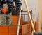 Bricklayer installing brick masonry on interior wall