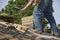 Bricklayer Mason Laying Chimney Bricks on House