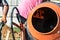 Bricklayer preparing concrete with a cement mixer to build a wall at a construction site