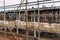 Bricks on scaffolding ready to be placed in construction site