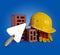 Bricks, trowel and helmet