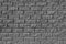 The brickwork texture. Grey wall