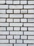 Brickwork. White silicate brick wall. Abstract background. Vertical frame