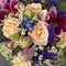 the Bridal bouquet of, asters and orange roses, blue bells, green protea and carnations for sale