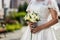 bridal bouquet in hands of the bride, bridal accessories, wedding European, American Wedding