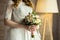 bridal bouquet in hands of the bride, bridal accessories, wedding European, American Wedding