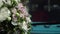 Bridal bouquet on a hood of blue retro bus