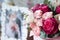 Bridal bouquet near photo of newlyweds in frame