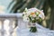 Bridal bouquet of roses, freesia, eustoma