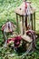 Bridal bouquet and three wooden lantern with candles stand