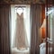 Bridal room ambiance Wedding dress hung elegantly on a curtain rail