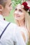 Bride admires attractive groom while standing before him