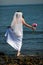 Bride barefoot in water