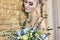 Bride in a beautiful turquoise dress in anticipation of wedding. Blonde in lace dress sea green with a bouquet . Happy bride