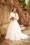 Bride beautiful woman in wedding dress - outdoor portrait