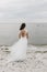 Bride from behind in bohemian wedding dress