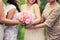 Bride with a bouquet and the bridesmaids