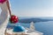 Bride with a bouquet of flowers. Santorini, Greece.