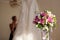 Bride, bouquet and wedding dress