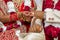 Bride with bridal jewelry and henna decoration on her hand attaches ring to her groom`s finger