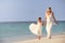 Bride With Bridesmaid At Beautiful Beach Wedding