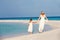 Bride With Bridesmaid At Beautiful Beach Wedding