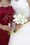 Bride and bridesmaid with flowers