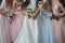 Bride and bridesmaids. Beautiful young women in dresses