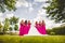 Bride with bridesmaids in a park