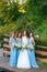 Bride with bridesmaids on the park