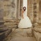 Bride between the columnes of the castle