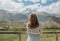 Bride dress waiting groom looking mountains snow peaks