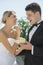 Bride Feeding Wedding Cake To Groom