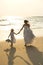 Bride and flower girl walking