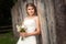 Bride in front of wooden fence portrait