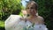 Bride funny adjusts her dress before meeting her groom