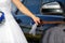 Bride gets into the car