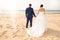 bride and groom on the beach Just married couple