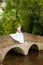 Bride and groom on a bridge