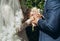 Bride groom ceremony holding hands conceptual love