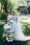 bride and groom with champagne glasses and cake