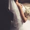 Bride and groom closeup, veil wedding dress