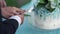 Bride and groom cutting wedding cake