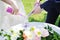 Bride and groom doing sand ceremony during wedding