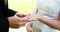 Bride and groom exchanging wedding rings