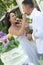 Bride and groom feeding cake