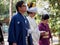 Bride and groom follow walk to Atsuta Shrine, Nagoya, Japan