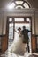 Bride and groom in front of vintage doors