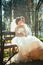 The bride and groom in the gazebo in the park