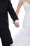 Bride and groom hands holded together